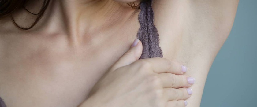Ból pod pachą — przyczyny i objawy