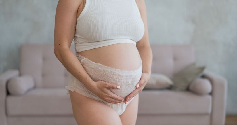 inkontynencja w ciąży, nietrzymanie moczu w ciąży, kobieta w ciąży w pieluchomajtkach