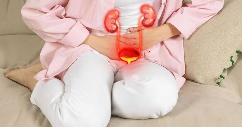 Kobieta cierpiąca na bóle układu moczowego. Uroflowmetria, badanie uroflowmetryczne.